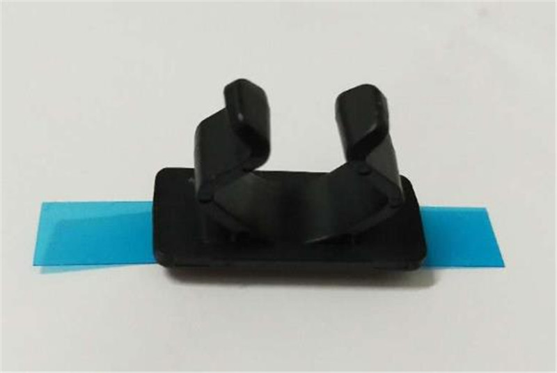 Installation of adhesive plastic fixing clamp for solar PV system connection